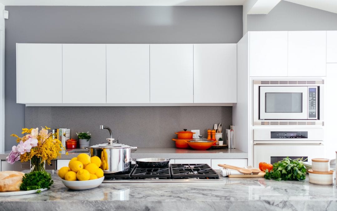 Learn how to hang kitchen cabinets like a pro